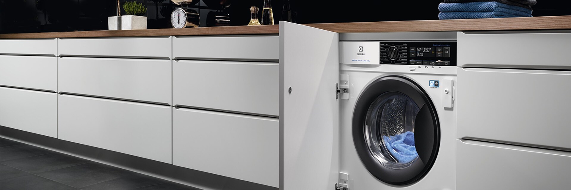 Masina de spalat rufe cu uscator incorporabila Electrolux