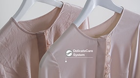 Pink shirts on hangers