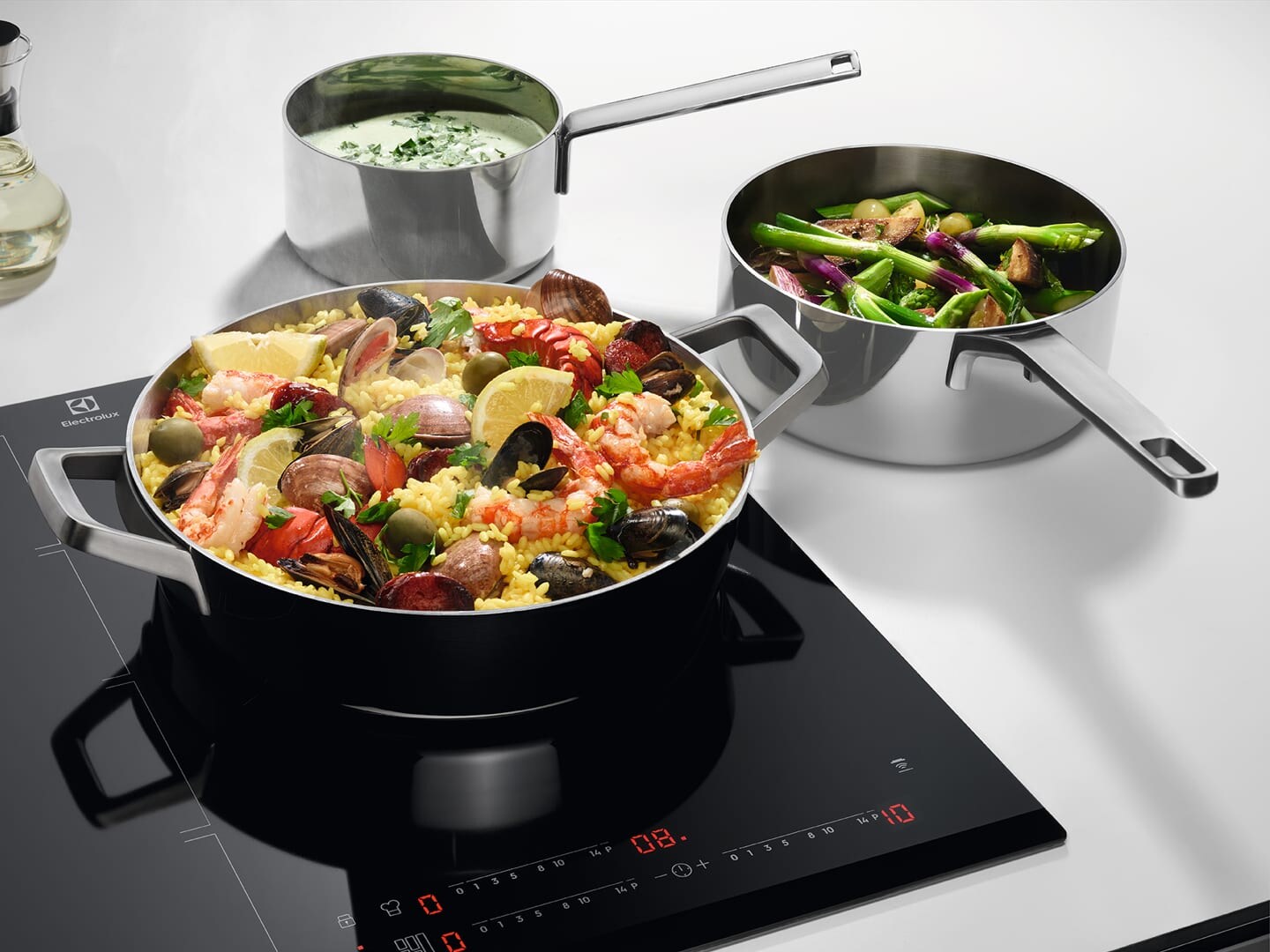 food in pots on hob and counter top