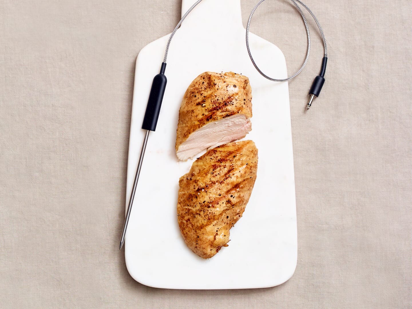 chicken and food probe on cutting board